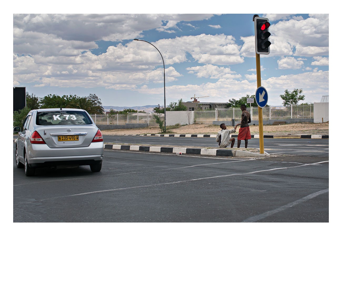 Windhoek_Nothern-Industrial_Street-Kids-and-a-Taxi-Number-K-73